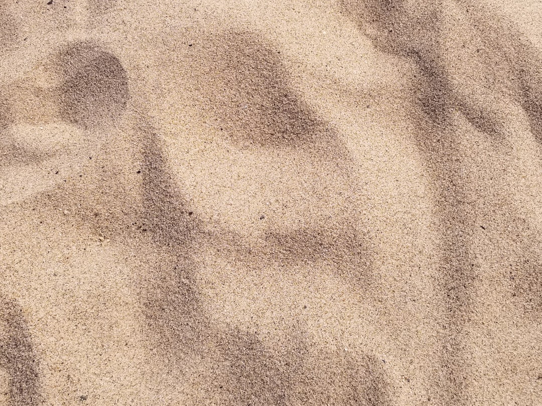 Close-up texture of sand with natural patterns